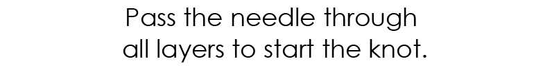Pass the needle through all layers to start the knot.